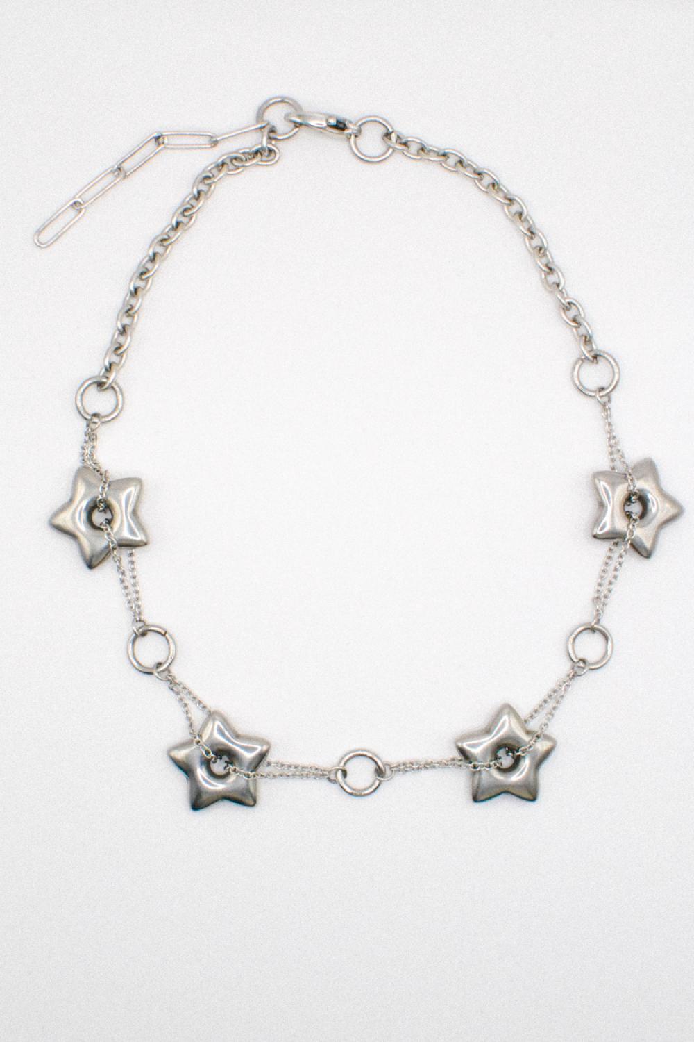 Photo du bijoux :  Collier Ras de Cou Étoiles Argentées #3