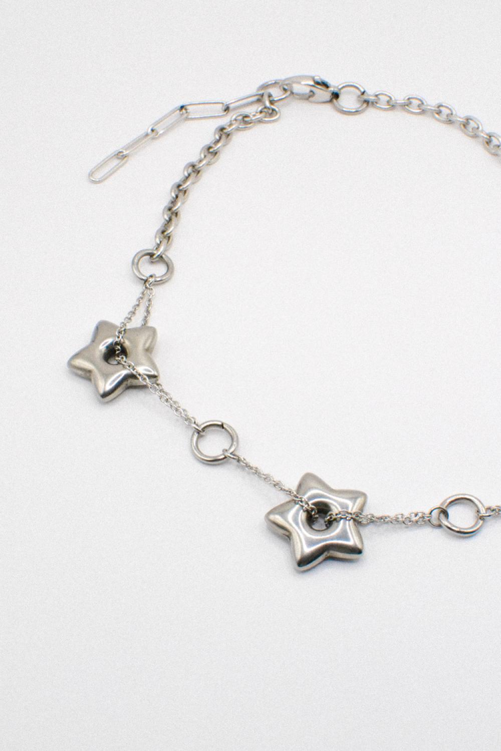 Photo du bijoux :  Collier Ras de Cou Étoiles Argentées #5