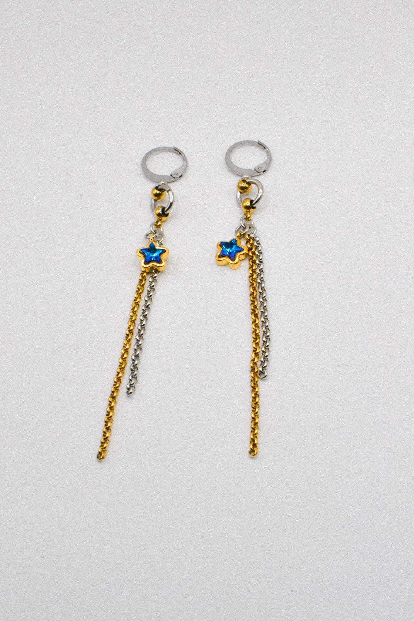 Photo du bijoux :  Boucles d'oreilles "Hot & Cold" - acier inoxydable doré et argenté et étoile bleue #4
