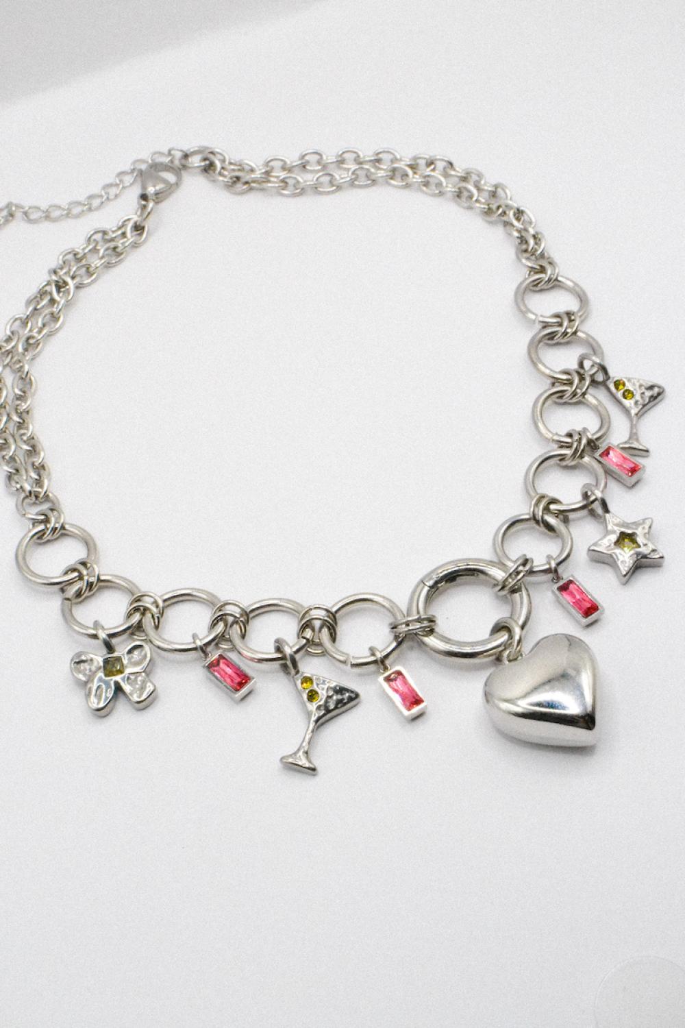 Photo du bijoux :  Collier “Party Girl” – Charms cœur & cocktail en acier argenté #1